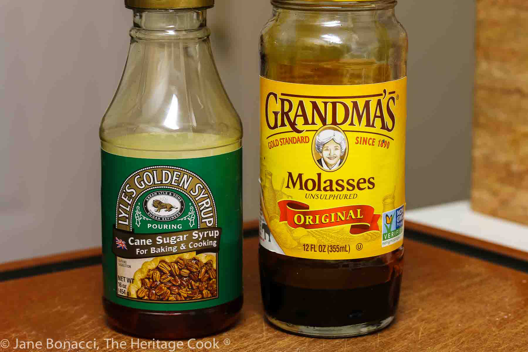 Bottles of Lyle's Golden Syrup and Grandma's Molasses. 