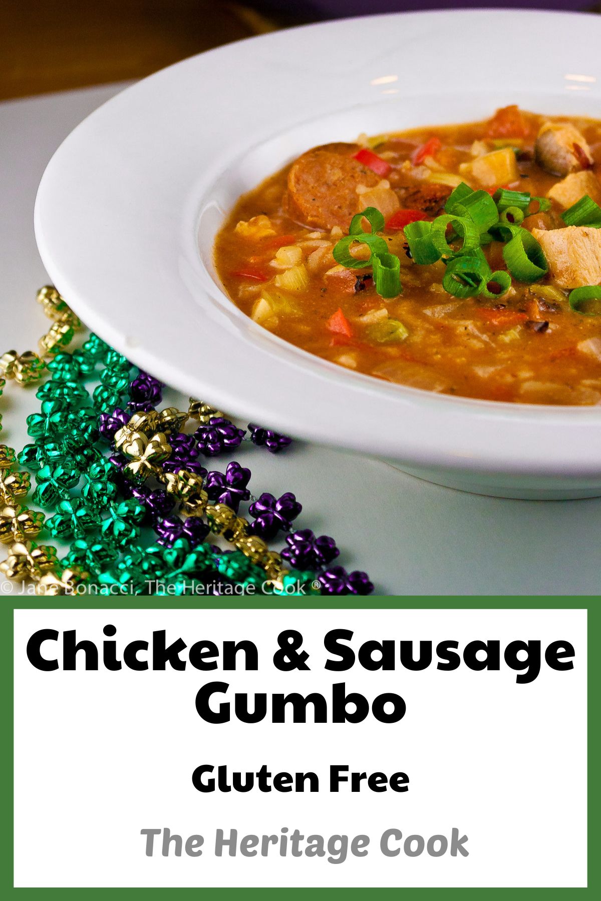Hearty stew with chicken and sausage, flavored with creole seasonings and lots of vegetables, decorated with Mardi Gras beads alongside; Chicken Sausage Gumbo © 2023 Jane Bonacci, The Heritage Cook.