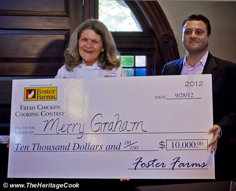 The grand prize winner, Merry Graham holding her enormous check for $10,000