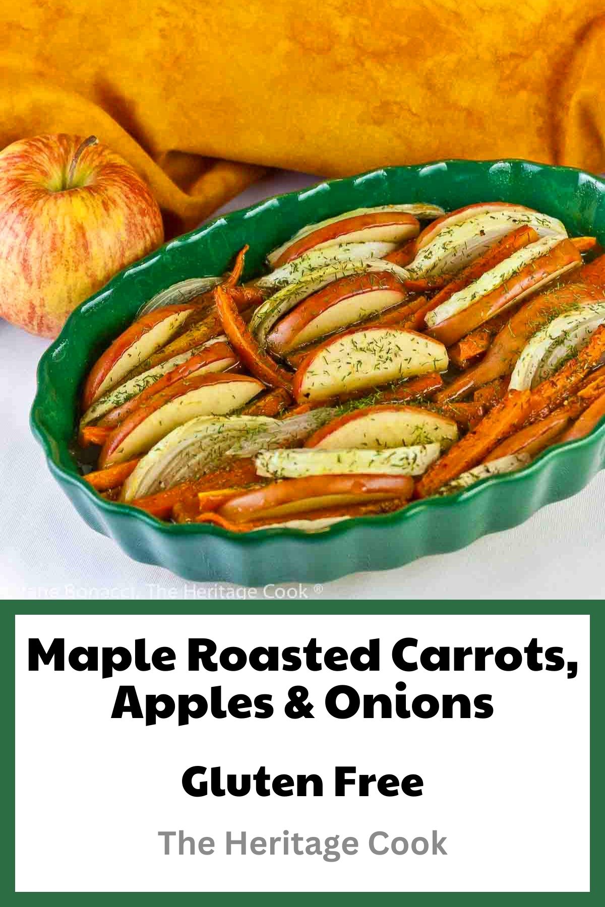 Carrots, apples, and onions sliced and tucked into layers in a green au gratin dish roasted with a maple glaze © 2023 Jane Bonacci, The Heritage Cook. 
