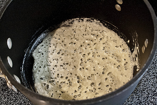 Cooking the roux until just barely changing to golden.