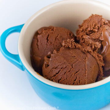 3 scoops of frosty chocolate gelato in blue and white bowls; Chocolate Brownie Bourbon Gelato © 2023 Jane Bonacci, The Heritage Cook.