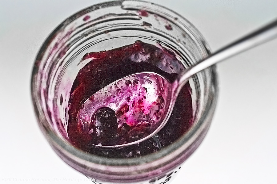 Homemade Blueberry Jam with spoon in an open jar