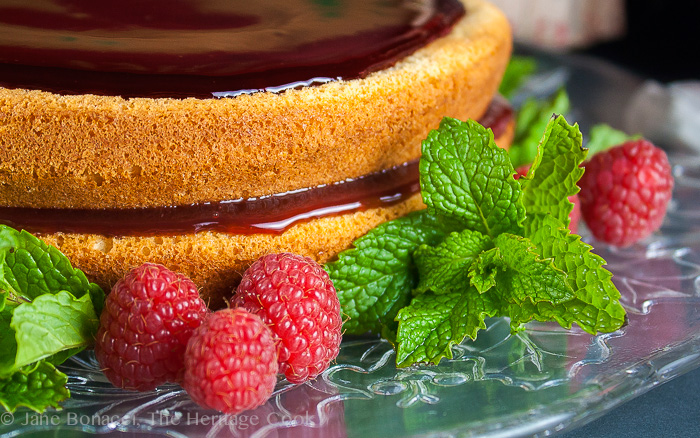 Almond-Raspberry Cake with Chocolate-Cassis Glaze; The Heritage Cook 2013.