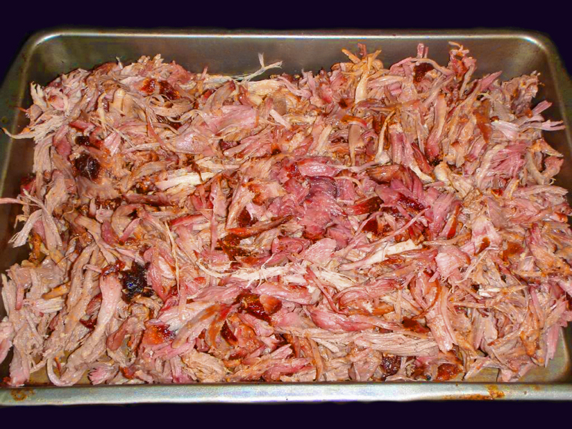 Cooked pork, pulled into pieces and ready for saucing