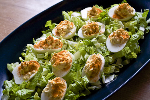 Deviled Eggs on a bed of shredded lettuce for Easter