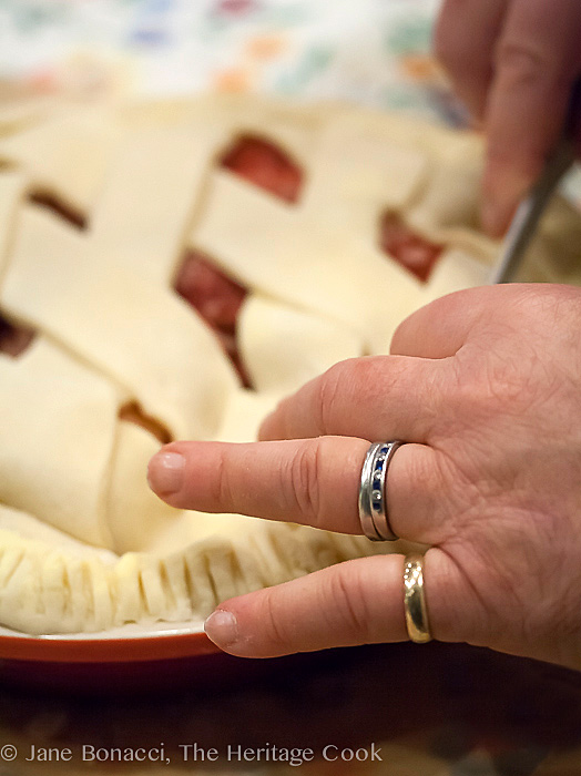 The hands of a master pie maker