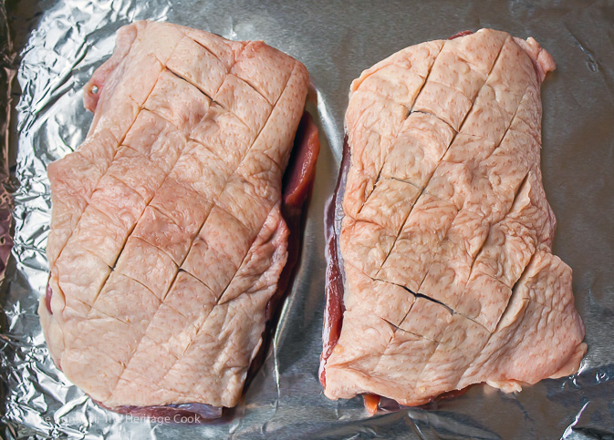 Scoring the skin and fat on a duck breast helps it render while cooking