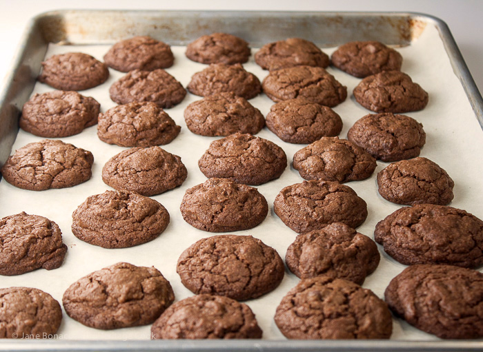 Dark chocolate cookies hot out of the oven and ready for the German chocolate cake frosting