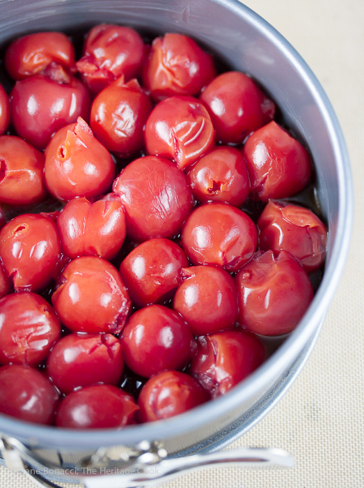 Cherries packed tightly in the baking pan before topping with the cake batter and baking