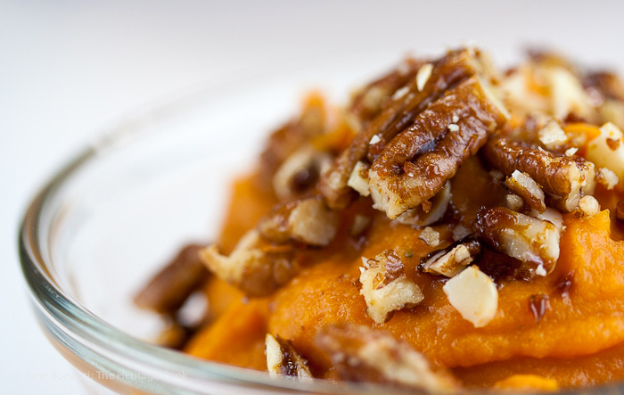 Candied pecans and almonds add the perfect crunchy bite to the maple whipped sweet potatoes, perfect for Thanksgiving! 