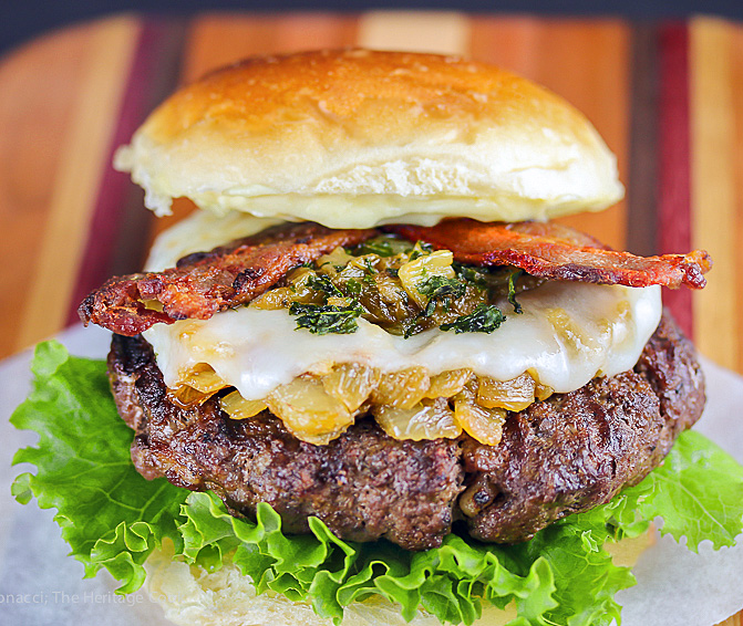Caramelized green chiles and Vidalia onions add tremendous flavor to these Santa Fe Green Chile Bacon Cheeseburgers; 2015 Jane Bonacci, The Heritage Cook