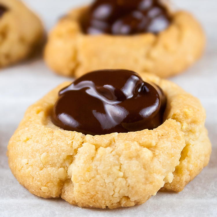 Nothing better to start your week than these Almond Thumbprint cookies with Chocolate Ganache filling! Chocolate Thumbprint Cookies (Gluten Free); 2015 Jane Bonacci, The Heritage Cook