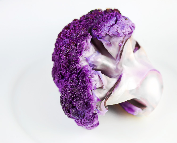 Single purple cauliflower floret; Roasted Whole Cauliflower with Sriracha Butter; 2015 Jane Bonacci, The Heritage Cook 