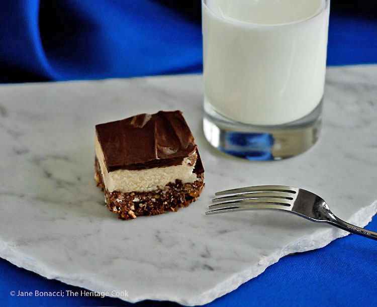 Nothing better than a glass of cold milk with chocolate desserts! Chocolate Coconut Nanaimo Bars (Gluten-Free); © 2016 Jane Bonacci, The Heritage Cook