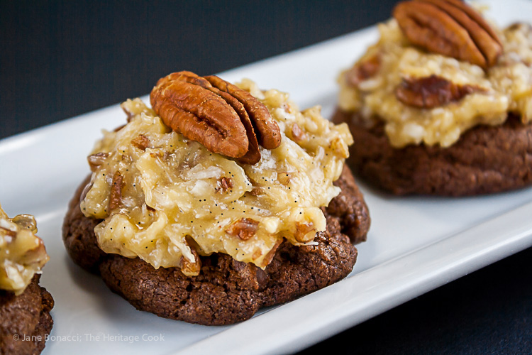 German Chocolate Cookies; dark chocolate cookies topped with coconut cake frosting and pecans; © 2014 Jane Bonacci, The Heritage Cook