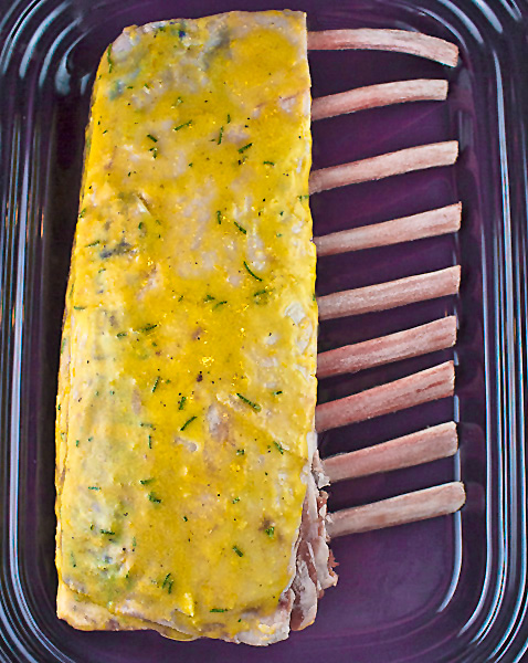 Mustard glazed rack of lamb ready for the oven; Frenched Rack of Lamb Roasted with Rosemary Mustard Glaze - Gluten Free; © 2016 Jane Bonacci, The Heritage Cook