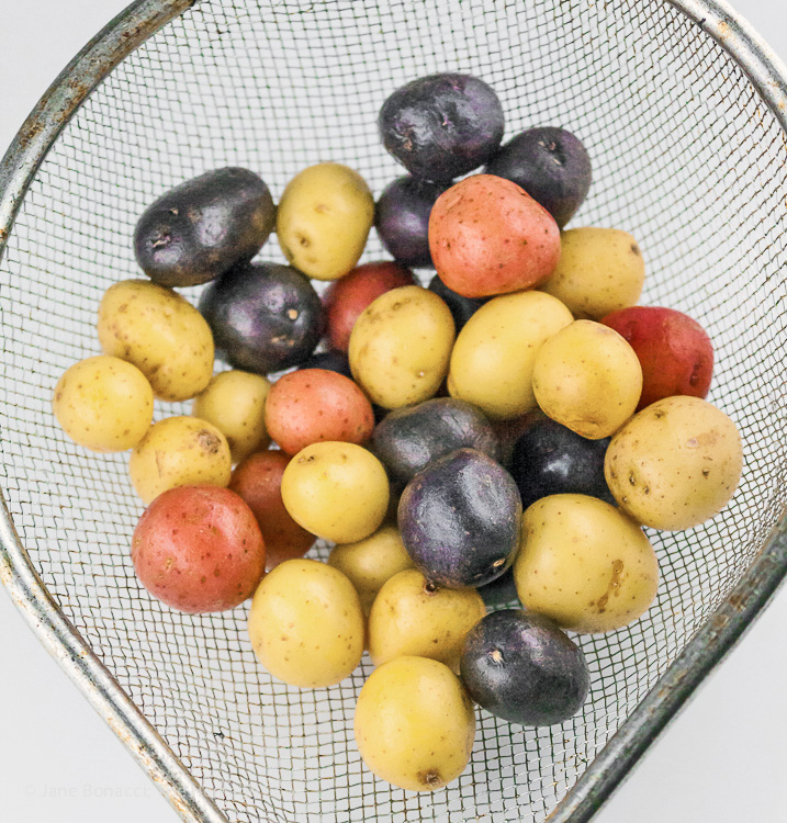Use mini multi-colored potatoes; Potato, Spring Vegetable, and Bacon Salad with Lemon Vinaigrette; © 2019 Jane Bonacci, The Heritage Cook