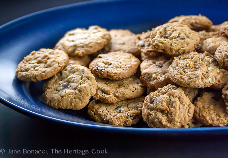 Perfectly baked cookies on a blue platter; Oatmeal, Chocolate Chip, Peanut Butter Cookies (Gluten-Free); © 2017 Jane Bonacci, The Heritage Cook