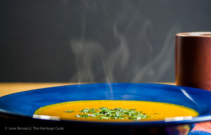 Steam rising from the hot bowl of soup; Roasted Sweet Potato Carrot Soup © 2017 Jane Bonacci, The Heritage Cook 