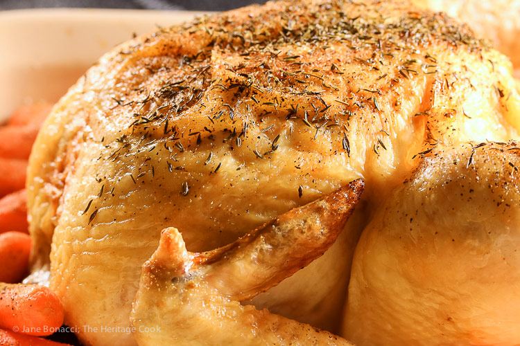 close up whole roasted chicken; Lemon and Cumin Scented Chicken from The Heritage Cook 2018 Jane Bonacci, The Heritage Cook