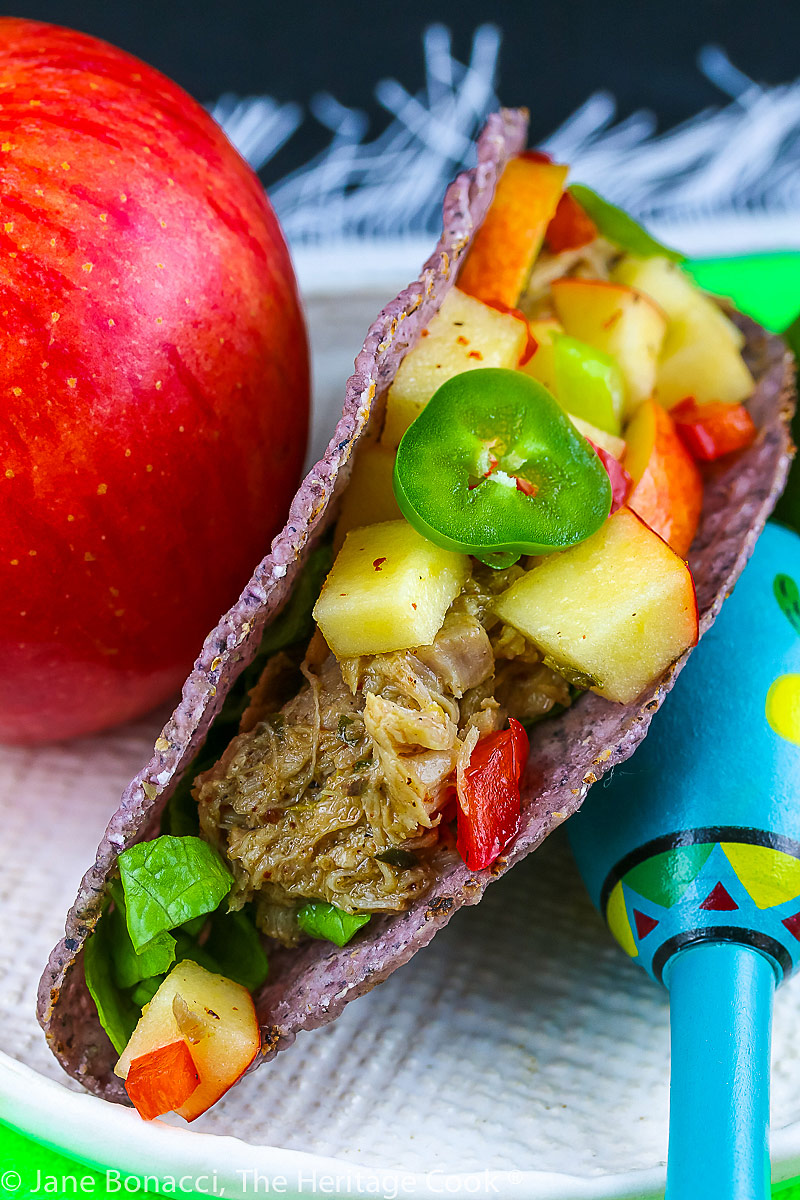 Chunky and spicy with apples, red pepper, green onions, and jalapenos, this apple salsa is a beautiful accompaniment to your tacos or a healthy side dish; Easy Apple Salsa with Pork Tacos © 2022 Jane Bonacci, The Heritage Cook.
