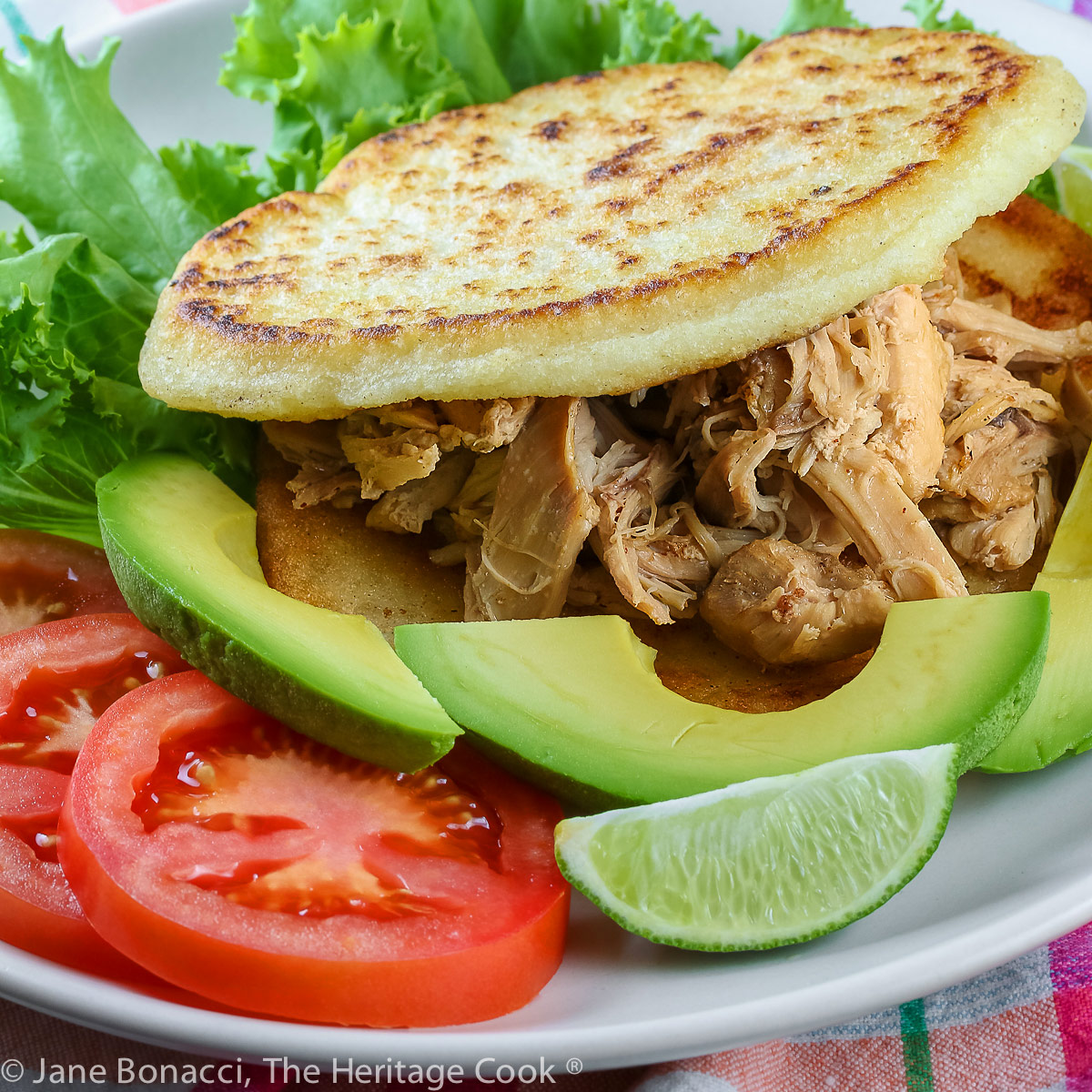 Instant Pot cooked Chicken is the filling for Latin American Arepas, similar to corn cakes; Chicken Filled Arepas © 2023 Jane Bonacci, The Heritage Cook. 