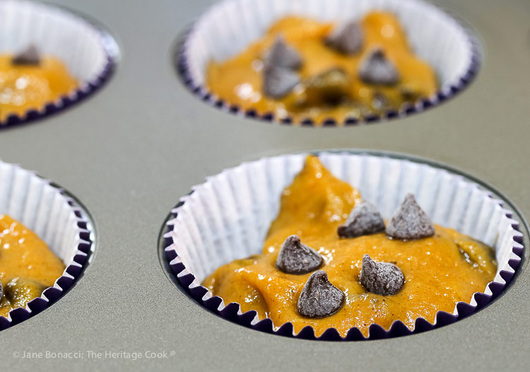 unbaked muffin batter in cups; Gluten-Free Chocolate Chip Pumpkin Muffins © 2018 Jane Bonacci, The Heritage Cook