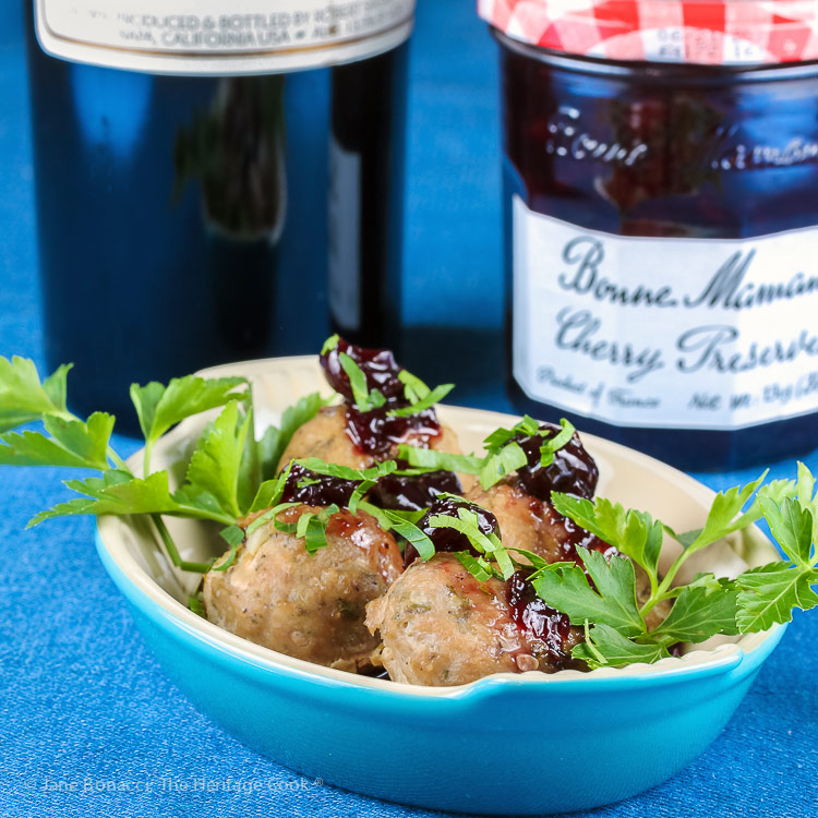 Bowl of meatballs with jam and wine; Cherry Red Wine Baked Turkey Meatballs © 2019 Jane Bonacci, The Heritage Cook