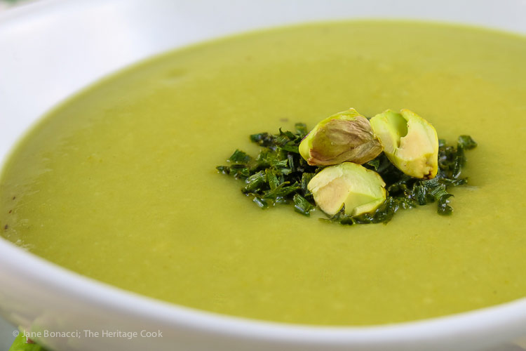 close up of pistachios and chives on soup; Creamy Asparagus Soup (Gluten Free, Dairy Free, Vegan) © 2019 Jane Bonacci, The Heritage Cook 