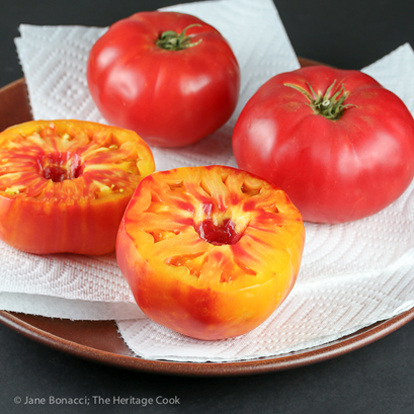 Whole & halved heirloom tomatoes; Roasted Rice-Stuffed Tomatoes © 2019 Jane Bonacci, The Heritage Cook