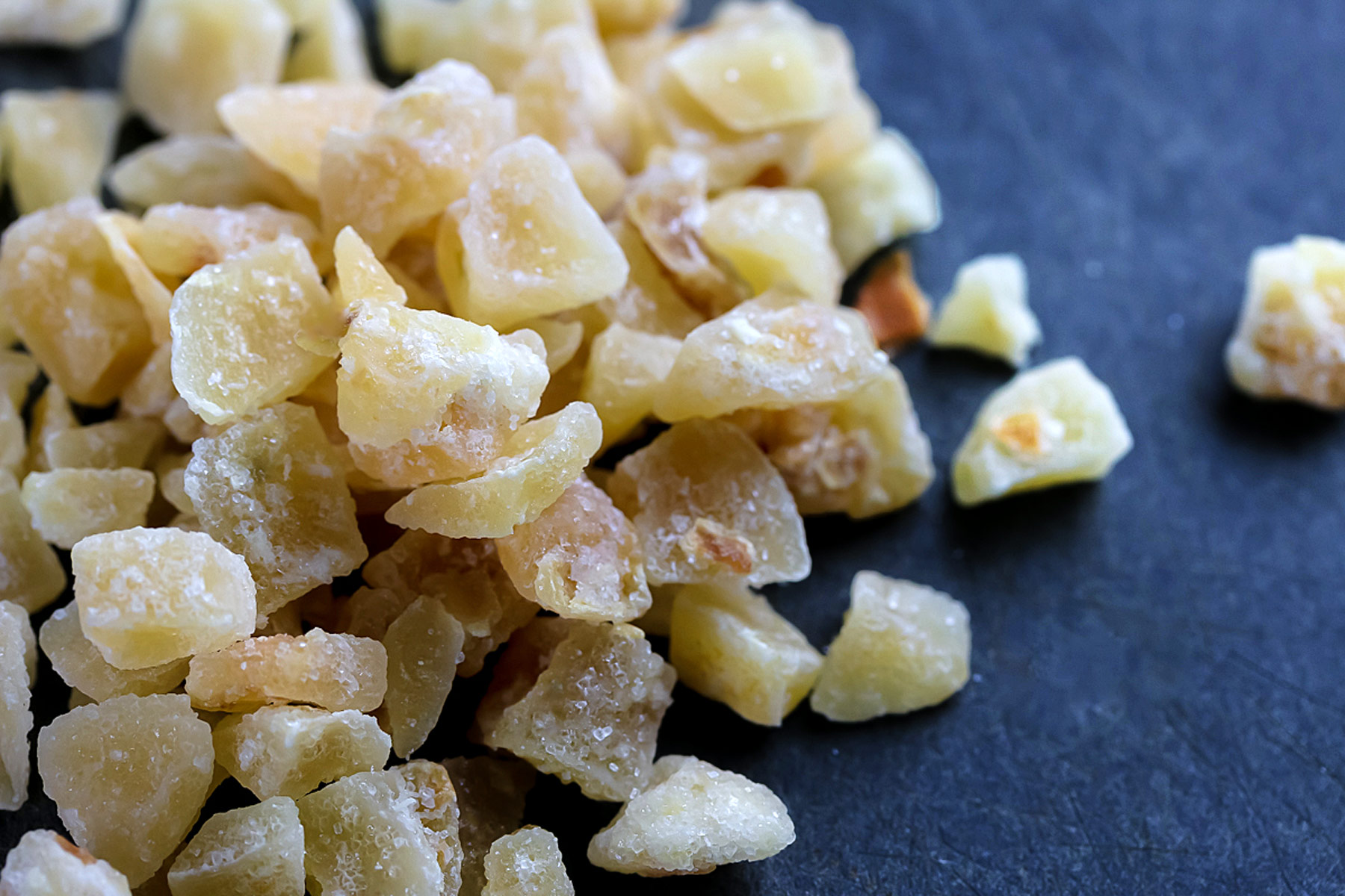 A pile of candied ginger pieces ready to be chopped for the cookies. 