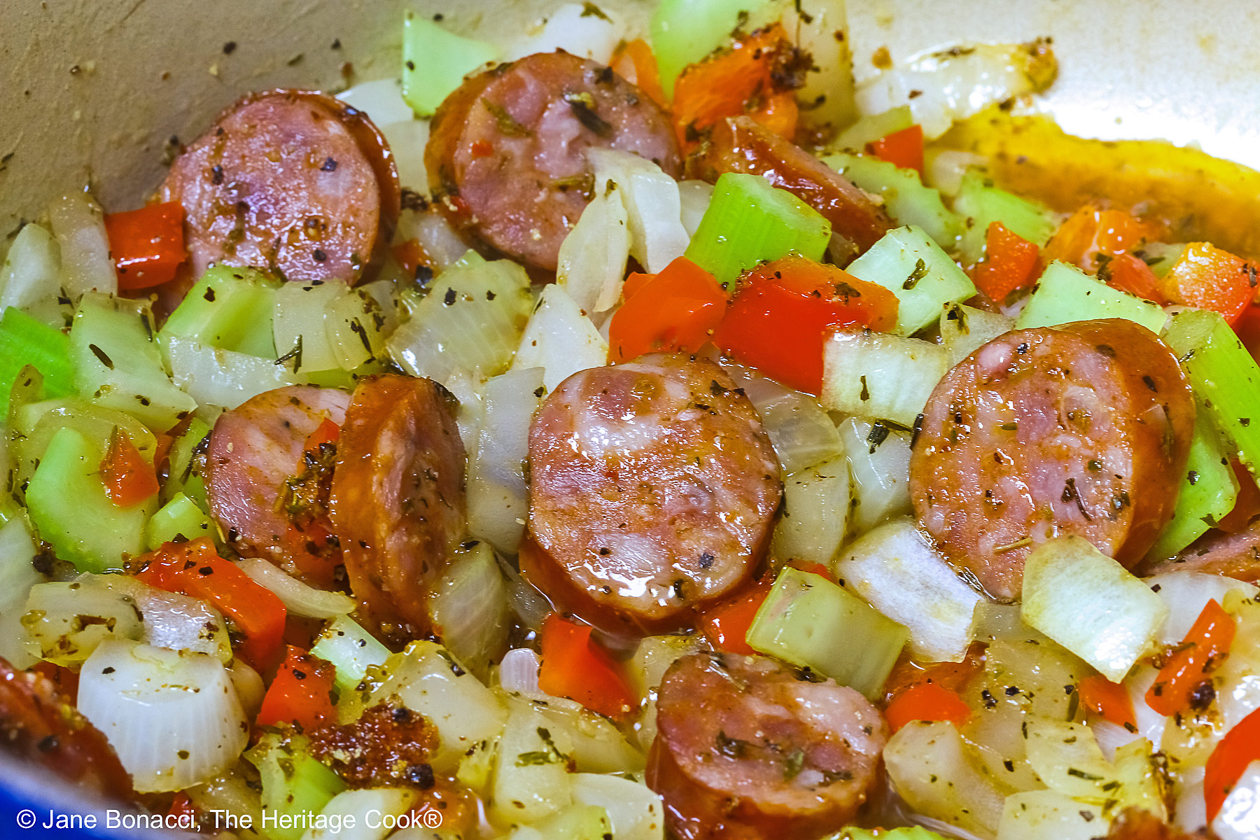 Sauteed vegetables with sliced andouille sausage.