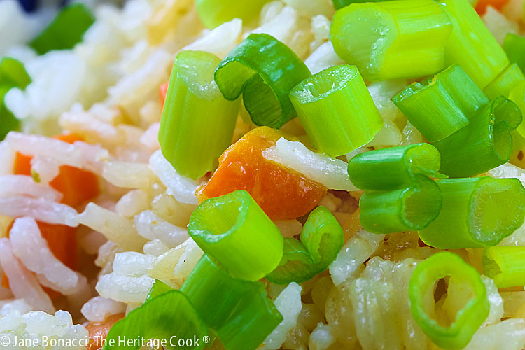 Close up of green onion toppings on the bowl of Hibachi Style Fried Rice