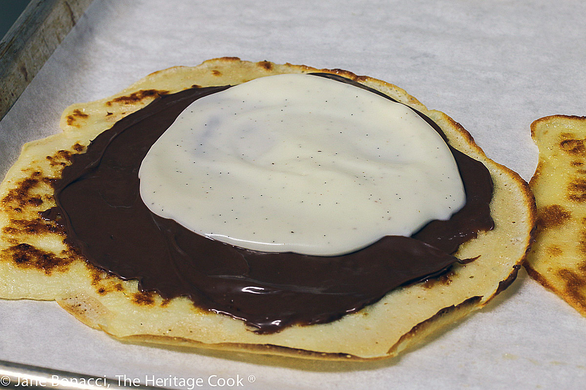 crepe spread with Nutella and the cheesecake fillings before folding
