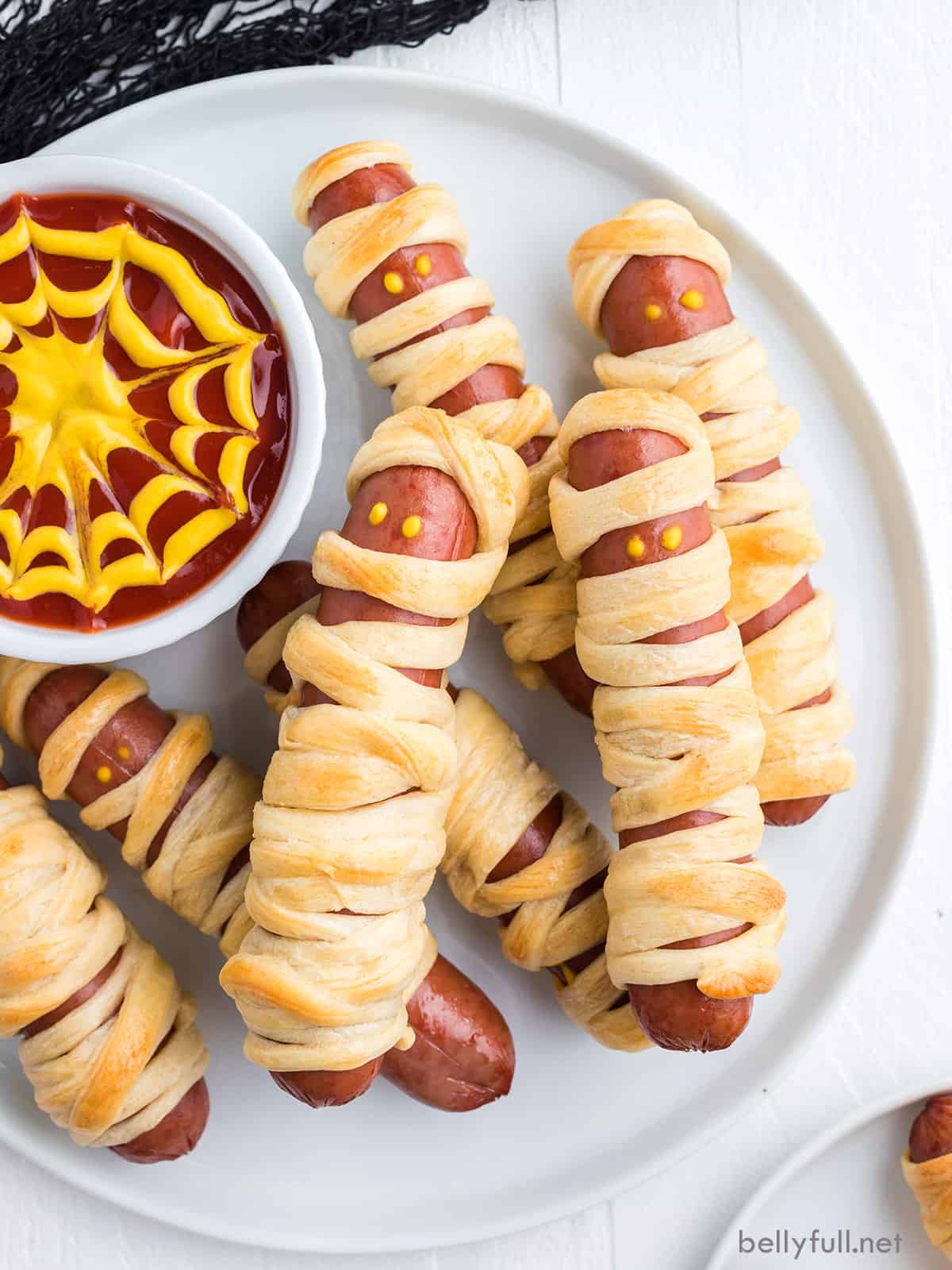 Mummy Wrapped Hot Dogs; Part of 15 Spooky Savory Halloween Dishes, assembled by Jane Bonacci, The Heritage Cook, 2022. 
