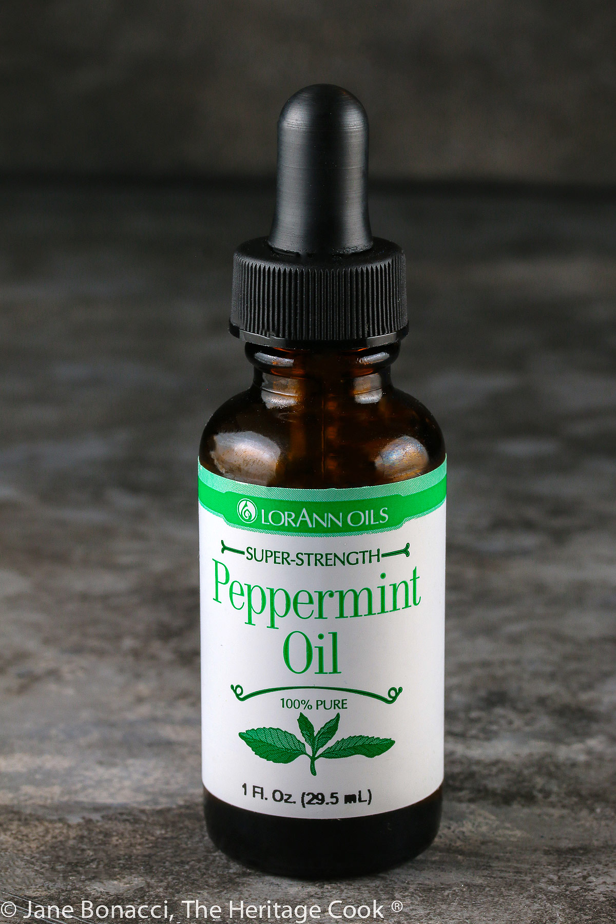 bottle of peppermint oil with special squeeze topper.