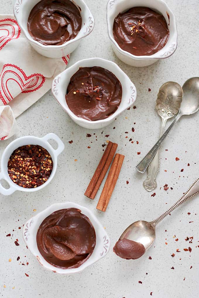 small cups of vegan chocolate mousse; Part of a round-up collection of recipes compiled by Jane Bonacci, The Heritage Cook, 15 Chocolate Desserts for your Holiday Table. 