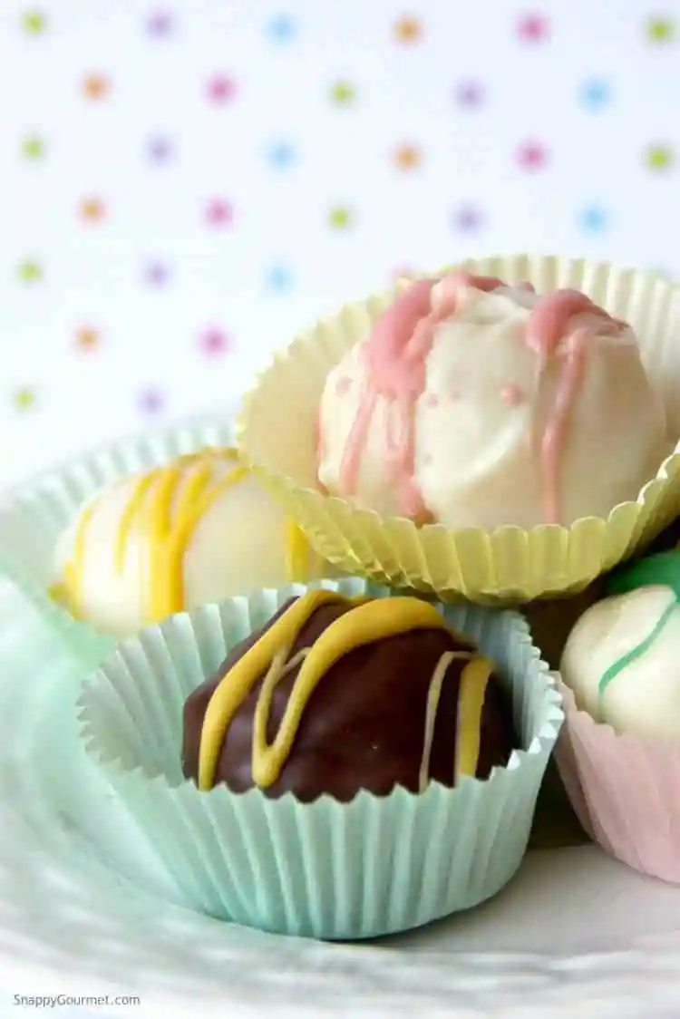 Cake batter truffles in pastel paper cups; 21 different chocolate treats in this blog post round-up are swoon-worthy; 21 Chocolate Easter Treats round-up 2023; assembled by Jane Bonacci, The Heritage Cook. 