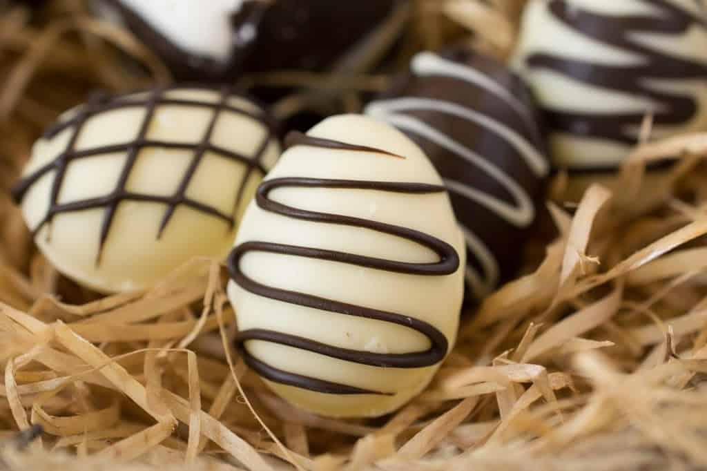 Candy eggs with zig-zag chocolate decorations; 21 different chocolate treats in this blog post round-up are swoon-worthy; 21 Chocolate Easter Treats round-up 2023; assembled by Jane Bonacci, The Heritage Cook. 