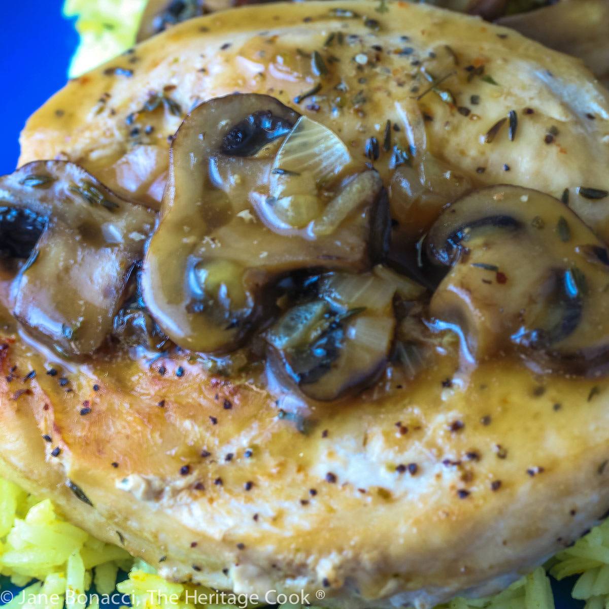 Close up of the mushrooms on top of the chicken. 