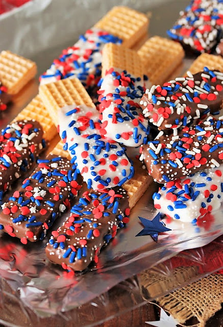 red white and blue dipped sugar wafer cookies; Collection of 10 of the Best 4th of July Chocolate Treats compiled by Jane Bonacci, The Heritage Cook. 