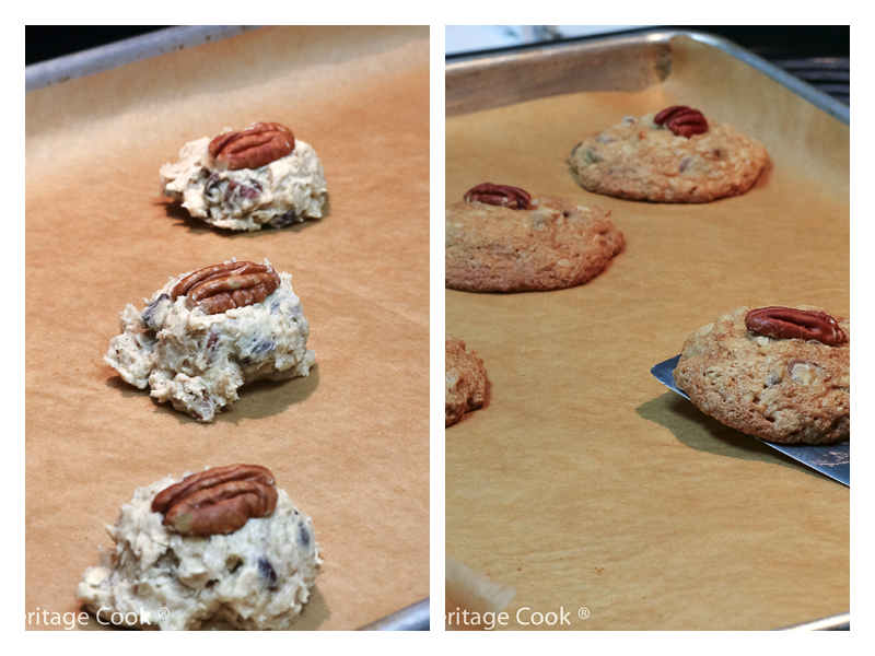 balls of dough with pecans on top; hot from the oven being lifted off baking sheet. 