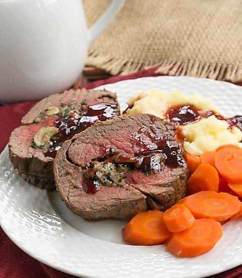 Gorgonzola Mushroom Stuffed Beef Tenderloin from That Skinny Chick Can Bake; Collection of 60 Amazing Recipes for Your Holiday Dinners compiled by Jane Bonacci, The Heritage Cook.