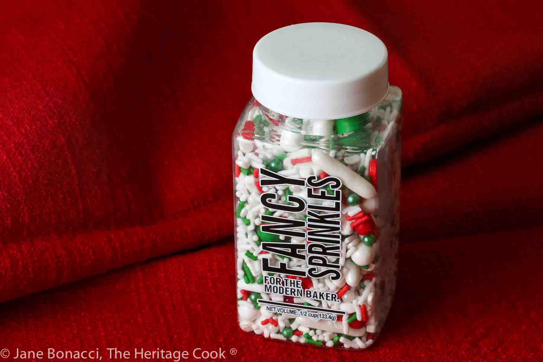 Jar of red, green, and white sprinkles for the whipped cream on top of the blondies from Fancy Sprinkles company. 