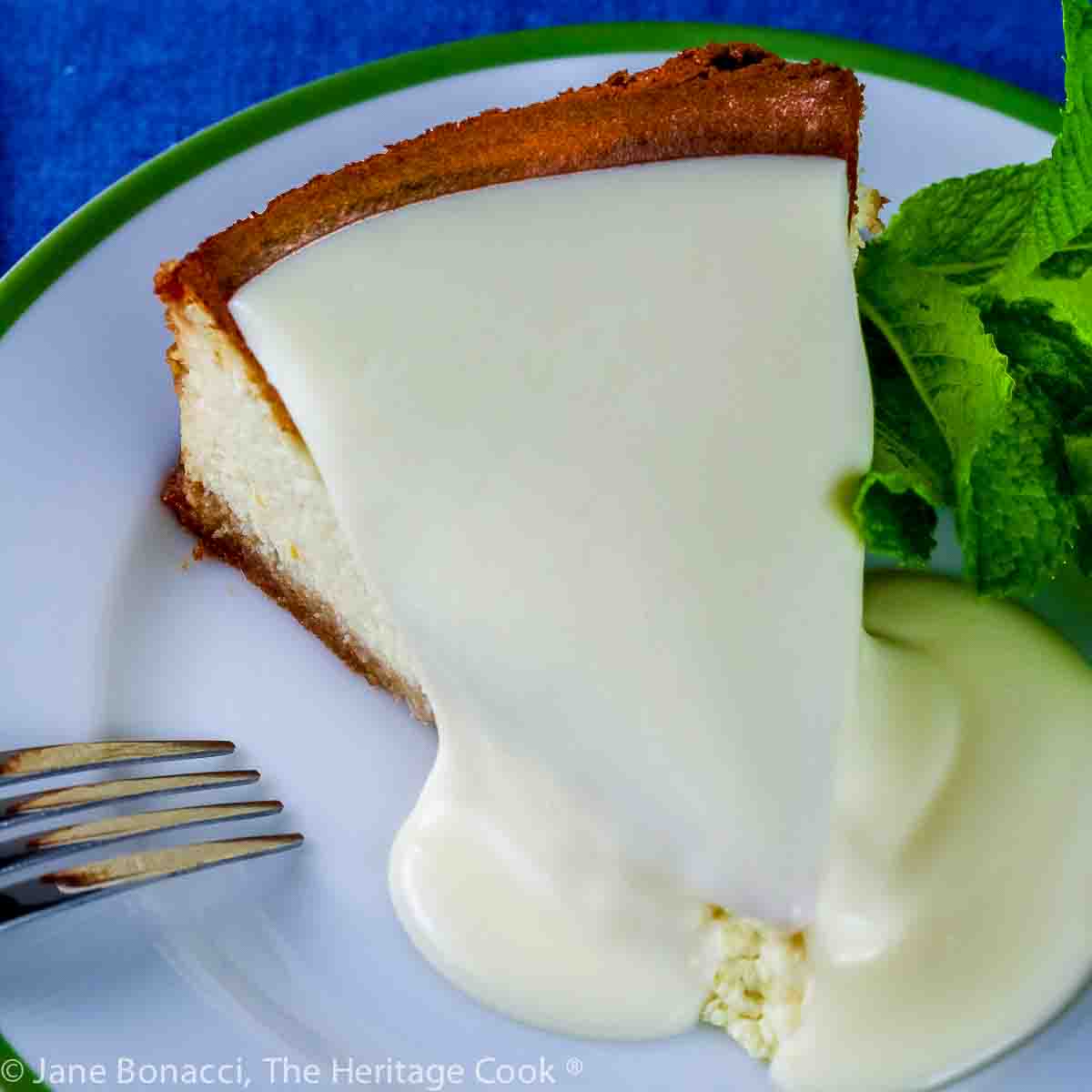 Classic cheesecake with Almond Crust; This is a compilation of the top 15 Fan Favorites for 2023 on The Heritage Cook. Collected by Jane Bonacci, The Heritage Cook © 2023. 