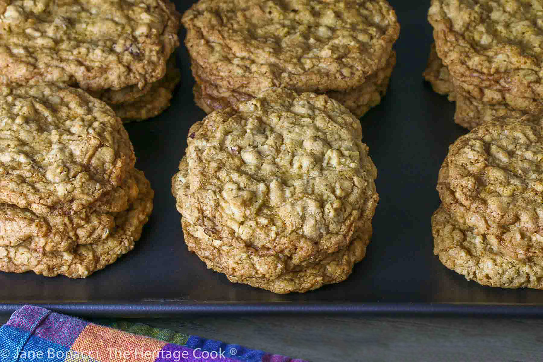 Looking down on stacks of oatmeal cookies with white chocolate and pecans, Jane Bonacci, The Heritage Cook.