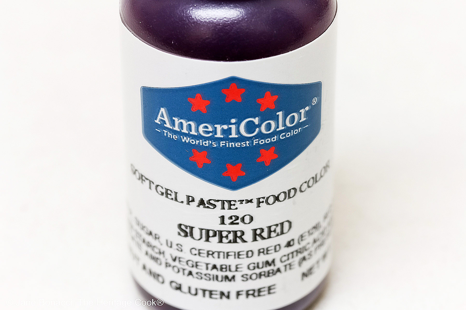 Bottle of red gel food coloring from AmeriColor. 
