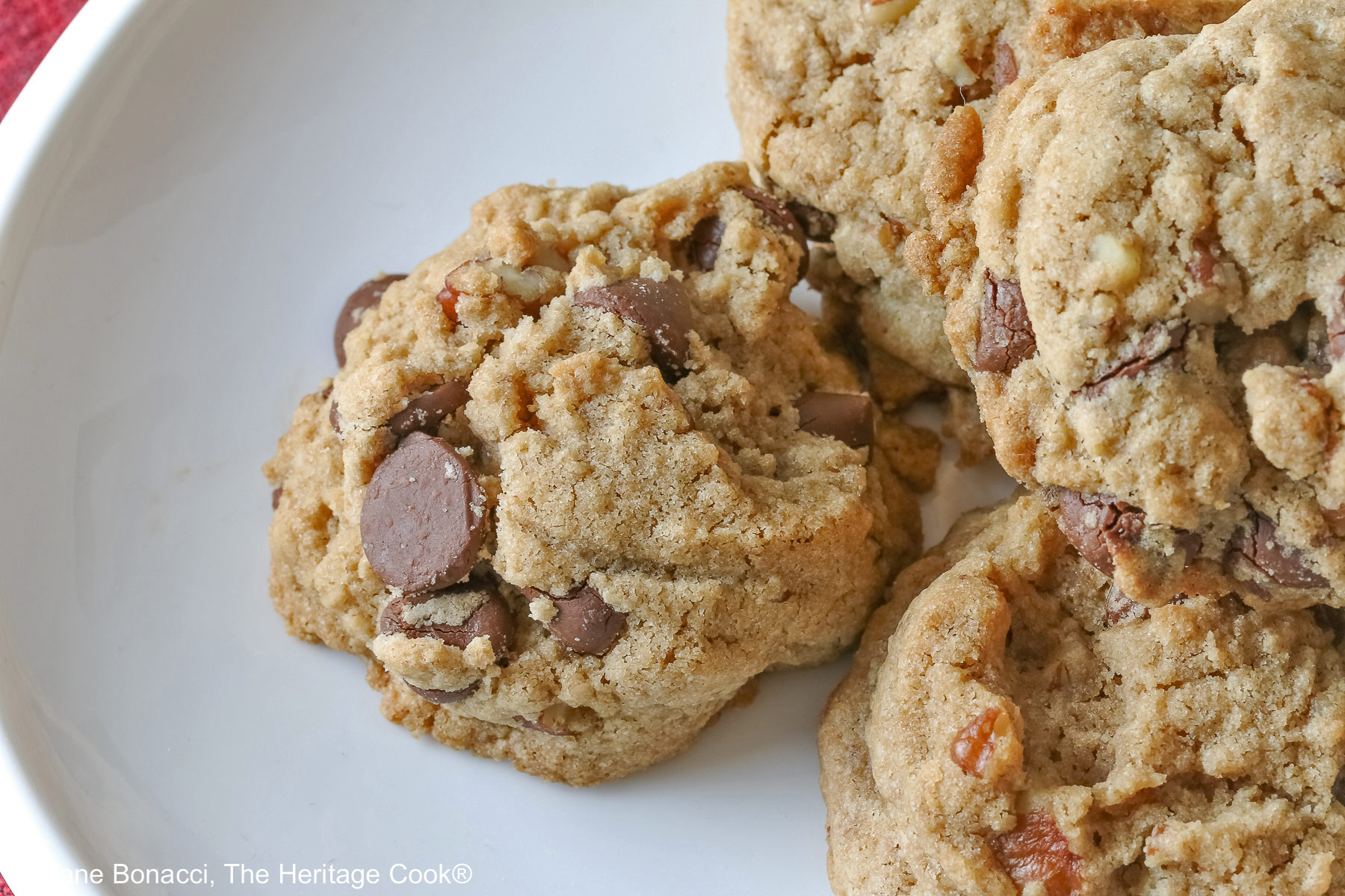 Focus on a single cookie on white plate. 