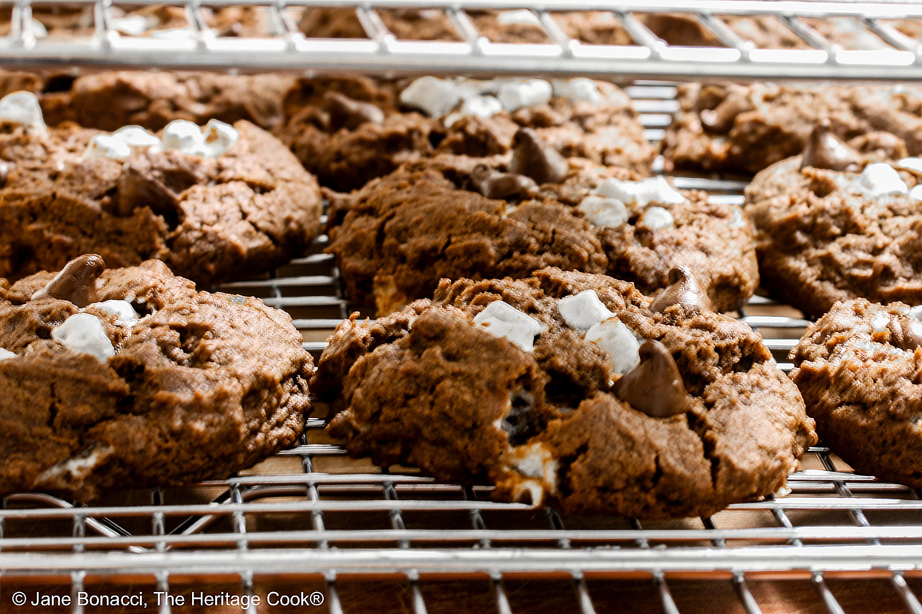 Cookies cooling on stacked racks.